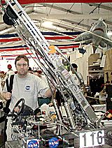 Eric with the robot at Epcot Center, April 2001